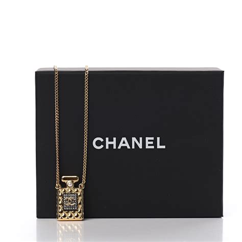 chanel perfume bottle pendant necklace|Chanel pearl diamond necklace.